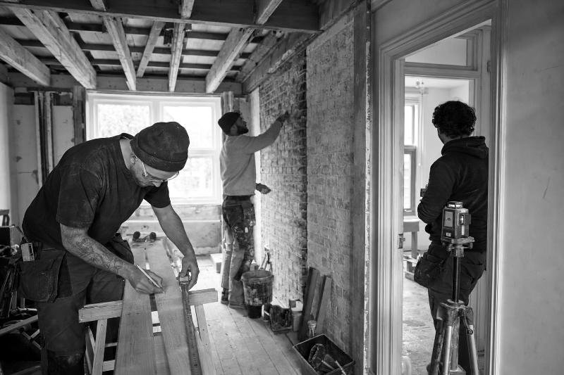 Contractors working inside a period property