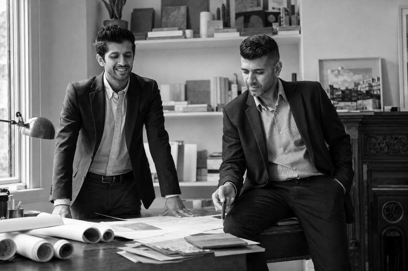 The co-founders of Ēastmans Developments together in their office